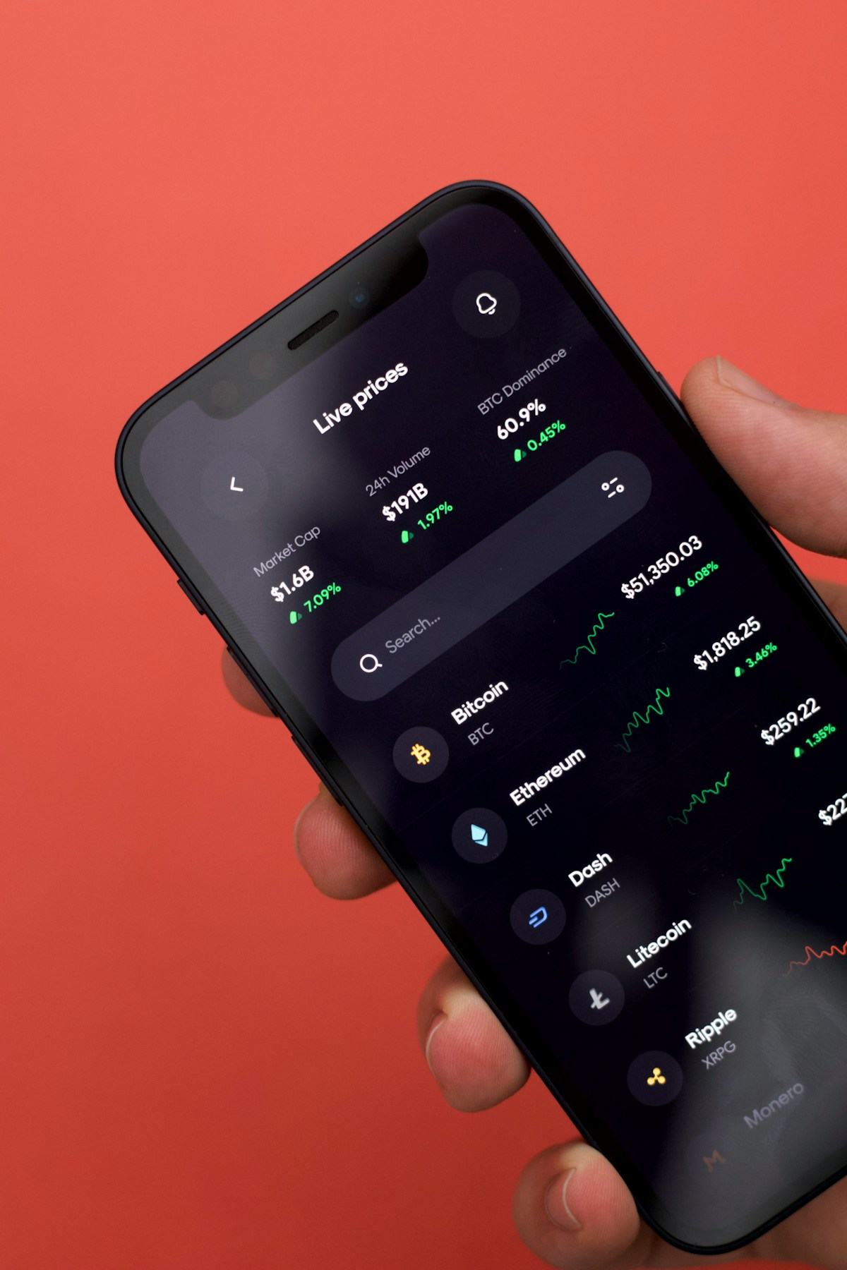 A smartphone showing a finance app with live price data