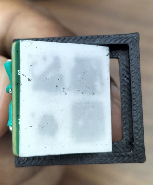 SiPM Array with ZnS(Ag)-Coated Plastic Film